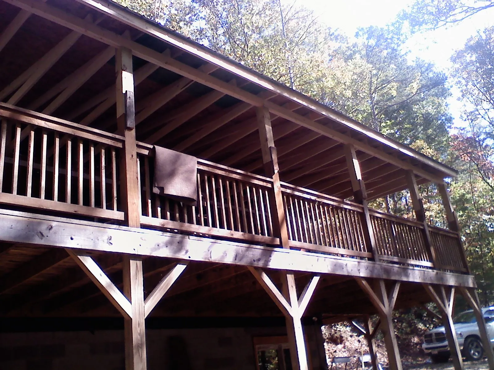 Timber framing under a new elevated porch and deck — Roof Leak Repair in Three Rivers by Roofing Brothers